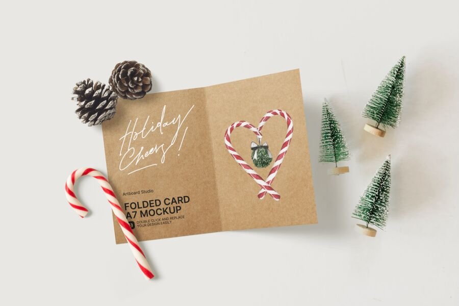 Start designing in your browser with this free mockup generator. Christmas Themed Kraft Folded Greeting Card Mockup Template